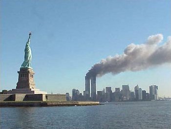 National_Park_Service_9-11_Statue_of_Liberty_and_WTC_fire.jpg